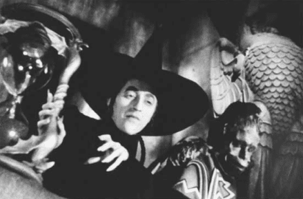 "The Wicked Witch of the West (Margaret Hamilton) with her servant Nikko"
