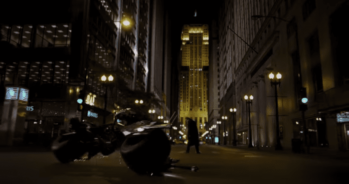 An iconic and game changing film itself, 'The Dark Knight' borrowed inspiration from the 1989 film, like this shot being reminiscent of the climax of the latter film during the parade scene.