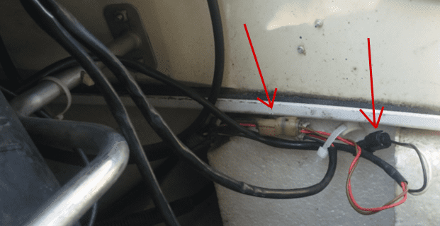 3. Follow the wires down to the black coupler (stop switch) and the white coupler (start switch).