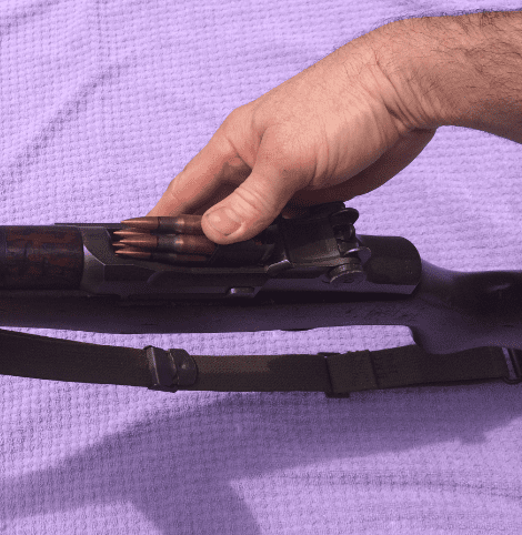 The M1's 8-round internal magazine is reloaded fast with en-block clips.