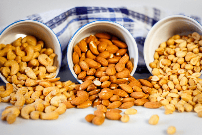 Nuts provide vitamin E and are a healthy source of fats in a vegan diet.
