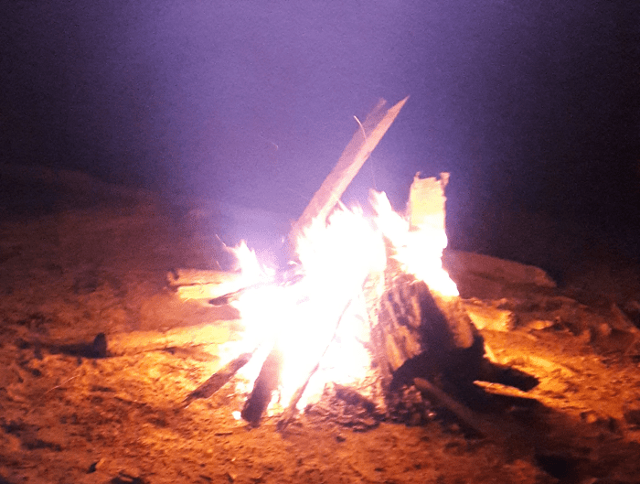 After erecting a tent, go collect stuff to build a fire at night, there are lots of tree branches or sticks around.