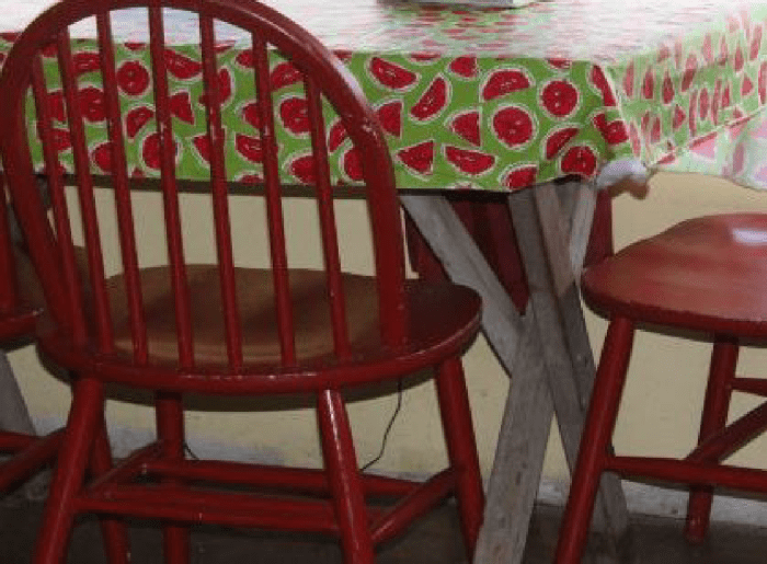 After dinner, she sat a minute too long at her small, makeshift dining-room table.