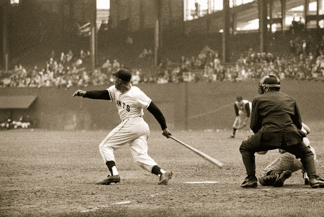 Mays at the Polo Grounds in the early '50s. You can get a sense of the odd shape and antiquated nature of the facility from this angle. The bullpens were actually in fair territory!