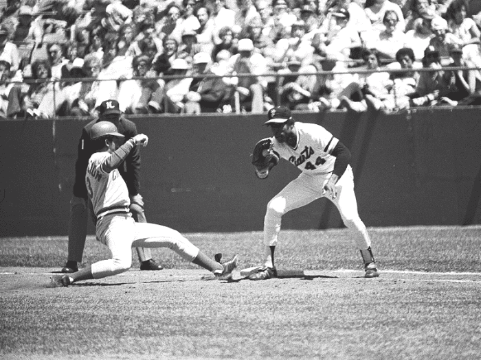 Former San Francisco Giants first baseman Willie McCovey takes a throw at first base against the Cincinnati Reds late in the 1980 season—his last year before retiring.