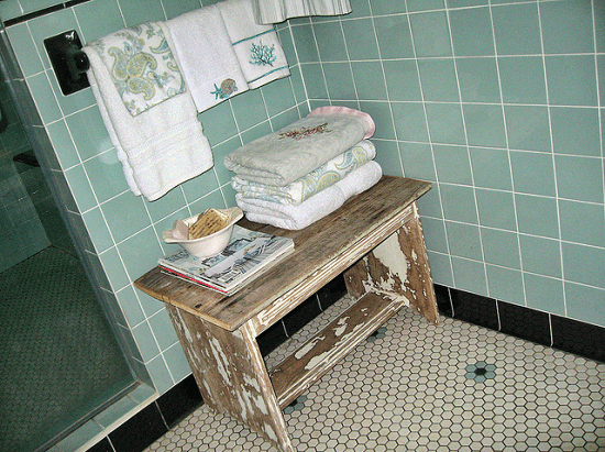 Typically shabby chic style - The look and feel of this old and worn-looking bathroom is characteristic of the distressed look of shabby decor.