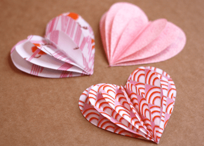 howaboutorange.blogspot.com has a pretty heart shaped garland for you to make. Click on the picture to find out how to make this garland.