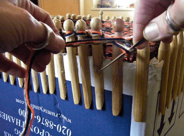 You can always construct your own loom in exactly the size you want - this example uses a cardboard box and clothes pegs!