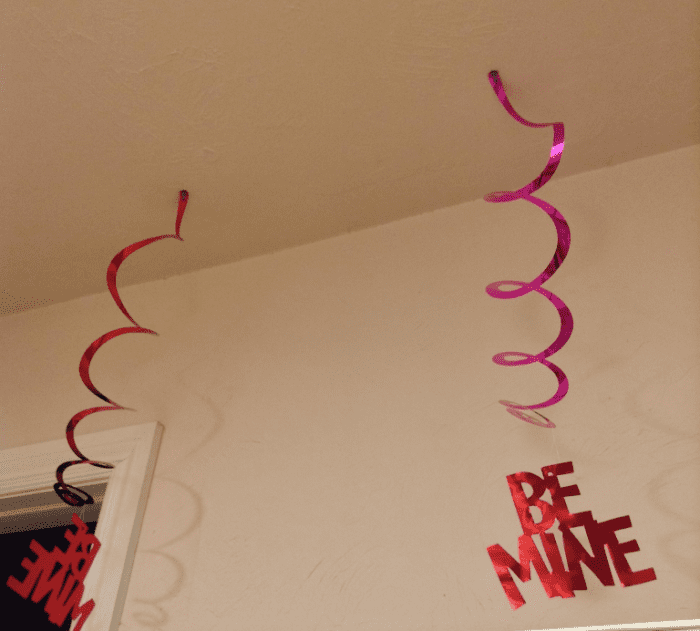 Don't have a lot of money for Valentine's Day? A homemade gift and simple decor from the party store can make for a romantic holiday without spending too much!