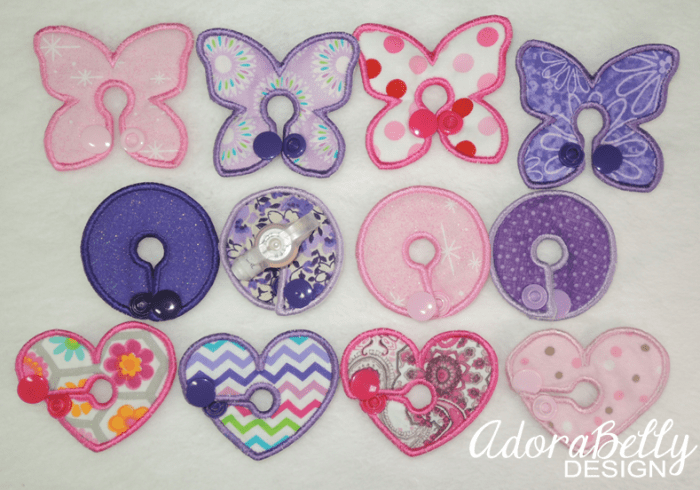 A sample of girl-inspired g-tube covers designed for a tubie by Julie. The photo is used with permission from Adorabelly Design.