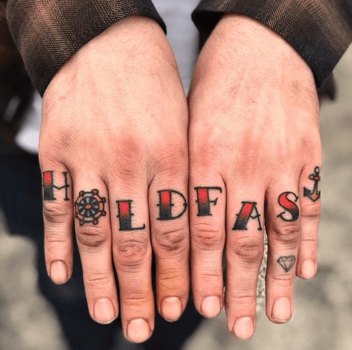 Word knuckle tattoos by @badlittleyou in Philadelphia, PA