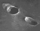 Featured in this picture are Messier and Messier A. Note that these are not circular like impact craters.