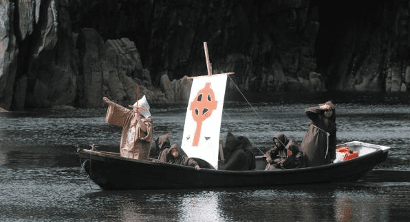 Students of Scoil Baile 'n Fhirtear (Ballyferriter School) recreating St. Brendan's voyage from Brandon Creek in 2010.