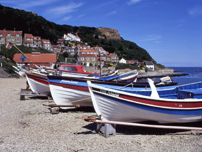 Yorkshire Cobles drawn up onto the strand - these boats are built in the same manner as Viking ships, from keel up