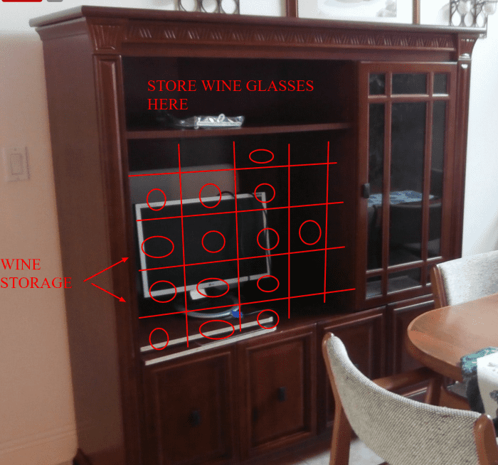 Get an insert to covert the large opening into a wine rack or if you do woodworking, make that yourself.