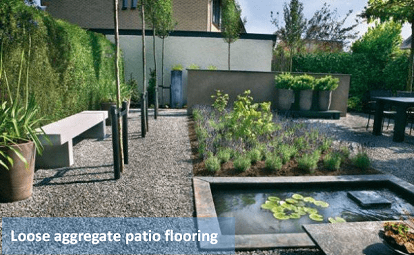 Patio with loose gravel flooring - Gravel and smooth pebbles are popular outdoor flooring materials.