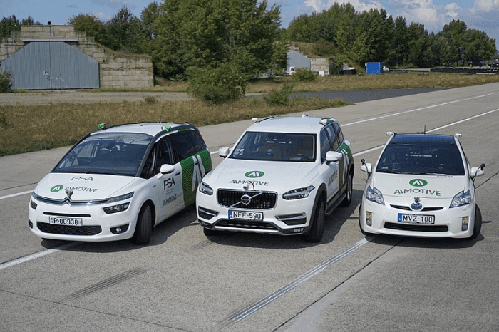 Shown above are three AImotive test vehicles, including (from left) a Citroen C4 Picasso, a Volvo XC90 and a Toyota Prius.