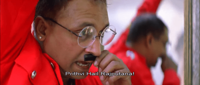 A scene in the movie when he waves at his brother putting this moustache on his lips to portray that his brother has the ideologies of that of a Hitler.