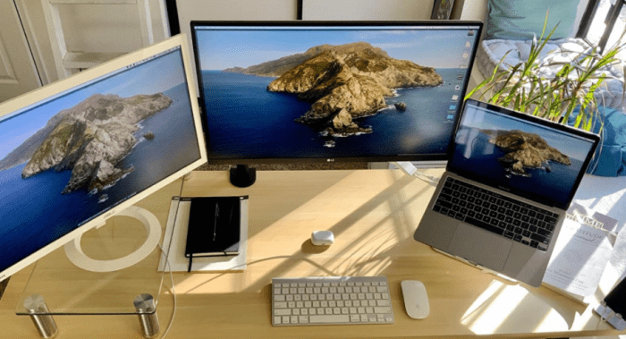 This 4k 27" display (middle) has a USBC to power that's perfect for my MacBook Pro. And while it's not frameless, it's pretty close.