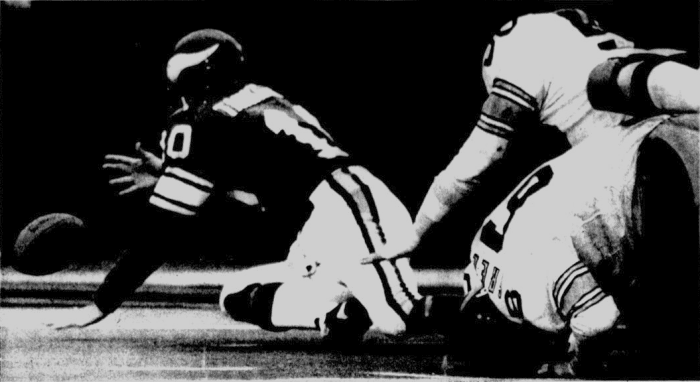 Fran Tarkenton loses a fumble during Super Bowl IX, a game which the Vikings would lose to the Steelers.