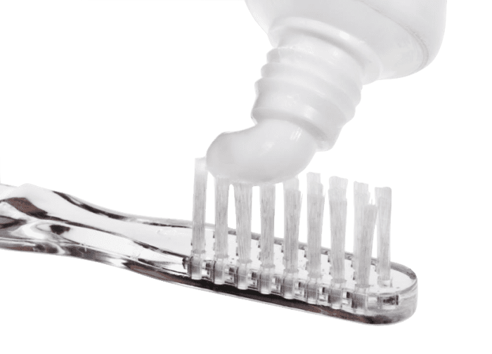 Dip your toothbrush into some hydrogen peroxide, add toothpaste and then add baking soda. If you do not want to use toothpaste, you do not have to. Simply, put baking soda on your toothbrush and brush.