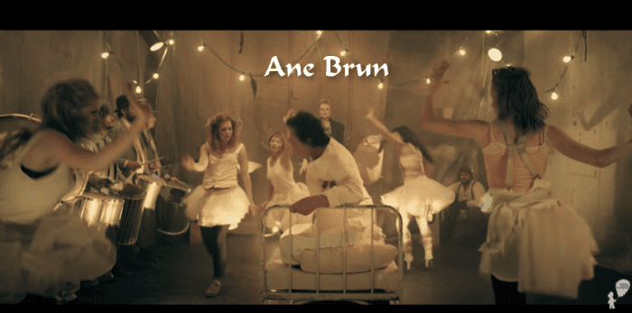 The "Do You Remember" music video has everything. Ane Brun singing, dancers in whimsical clothes, people banging drums, and a very confused man in a bed.