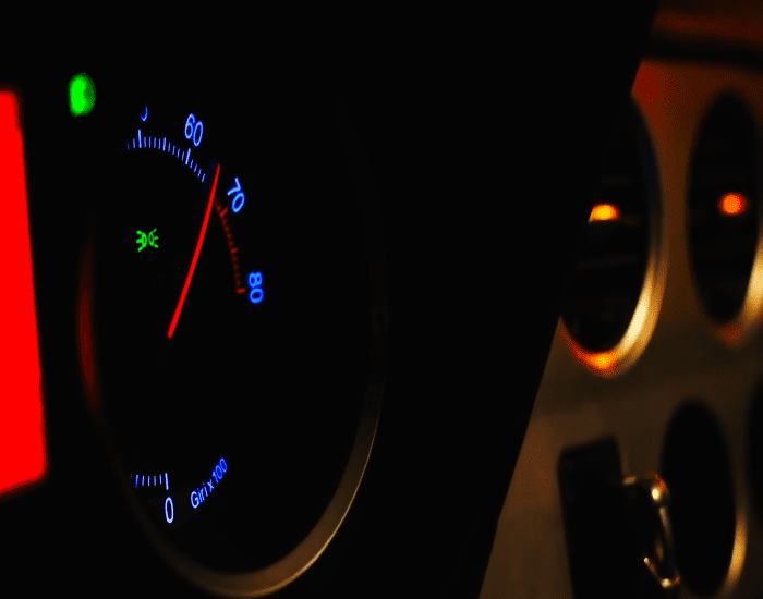 Revving the engine may hasten the warm-up process. But, doing so at low operating temperatures when the oil flow is not at optimum means that there will be a miniscule increase in wear due to insufficient lubrication.