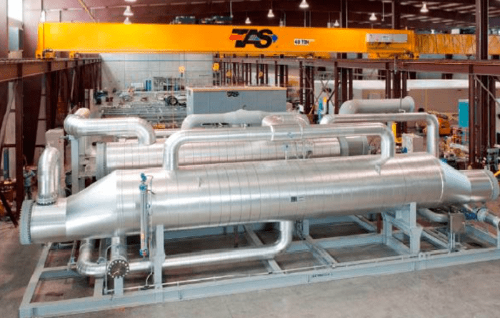 A high efficiency expander design at the Beowawe Flash plant which utilizes low temperature geothermal fluids to generate an additional 2.5 MW of electric power.