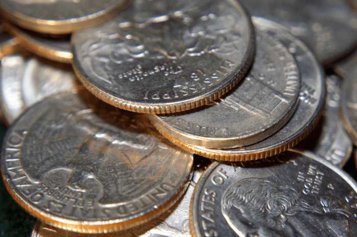 Note how the US quarters above have a layer of copper cladding. Silver coins don't have this and make them easy to spot.