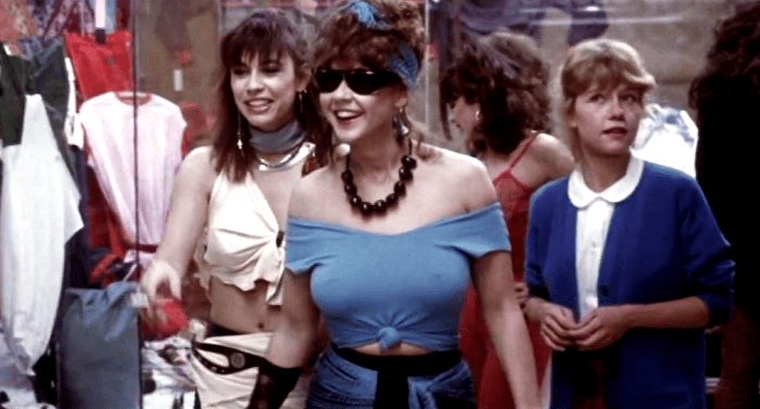 Francine (Lisa Freeman) Brenda (Linda Blair and Heather (Linnea Quigley) check out merchandise on the mean streets of Los Angeles