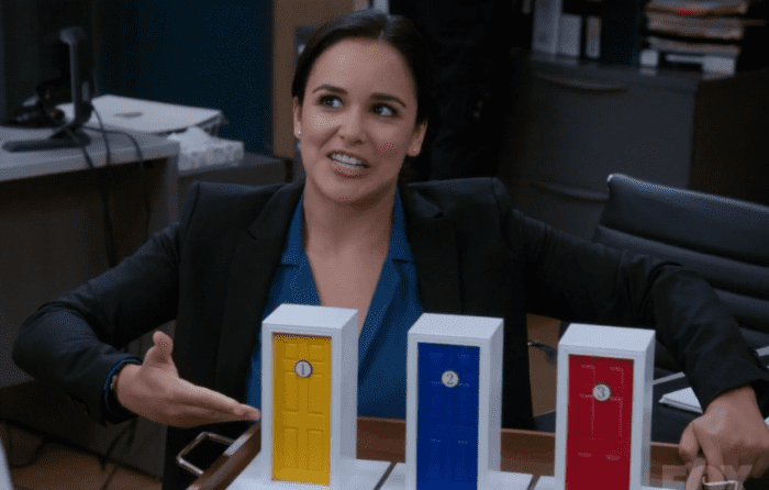 To switch or not to switch? Amy Santiago demonstrates the Monty Hall Problem to a skeptical Captain Holt on "Brooklyn Nine-Nine."