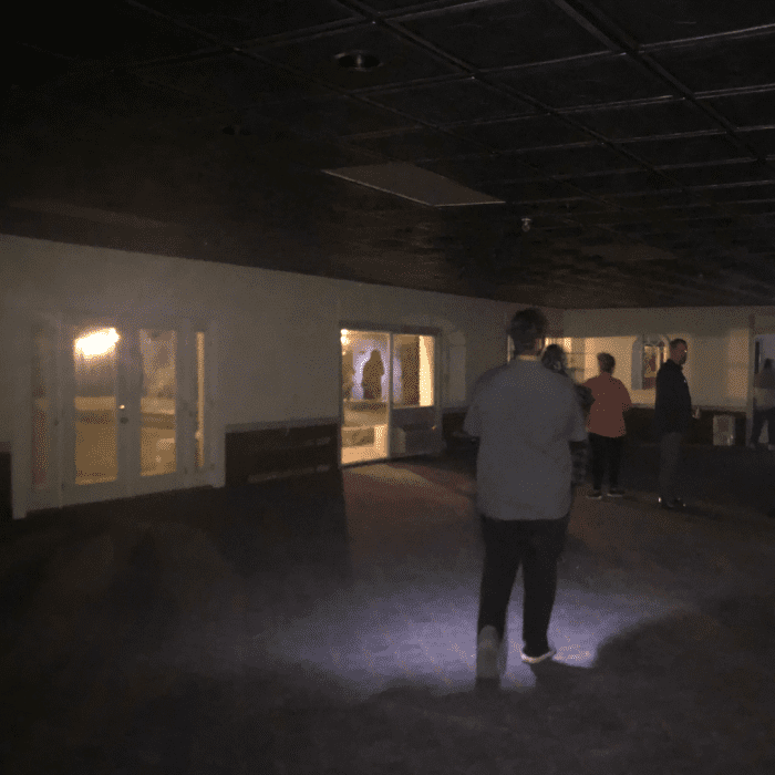 A photo I took while exploring the basement of the Green Park Inn after midnight! Though you can see the outline of a woman, reflected in the window in the center frame, I'm confident that this is a living woman who was also exploring the hotel.