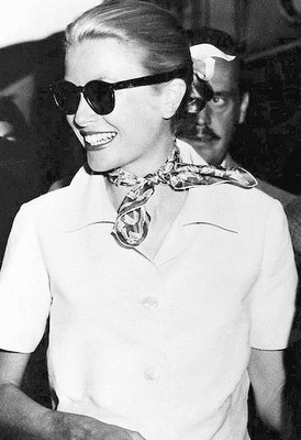 Grace Kelly sporting another great use of a fashionable scarf - a casual neck scarf