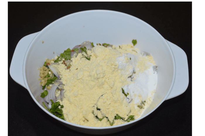 Add all the ingredients except "oil for deep frying" to a mixing bowl.