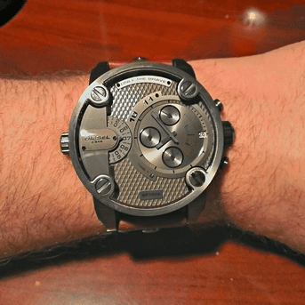 This Diesel SBA Only The Brave watch may be a little eccentric for some, but it's an eye catcher and definitely one of my favorites. At under $200 it's a good deal with it's unique watch face, functions, and calfskin strap.