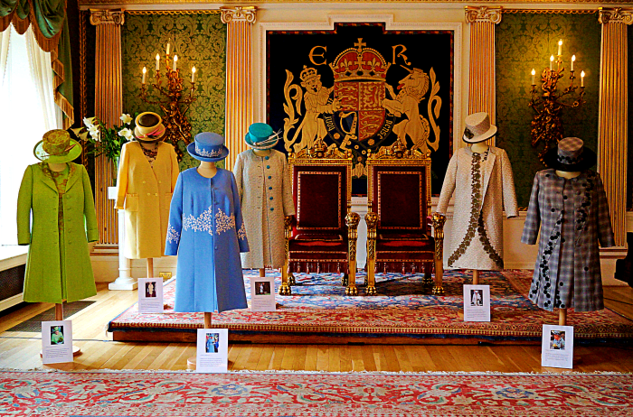 Five of the six outfits and all six hats were designed by Angela Kelly, The Queen's senior dressmaker from 2002–2022.