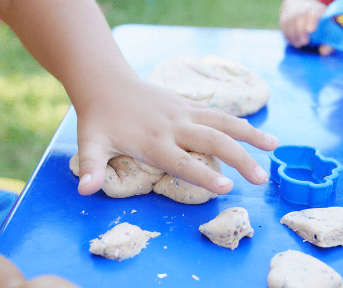 Playing with play-dohs is a brilliant way to develope fine motor skills, or those skills that help kids grab an object and hold it successfully.