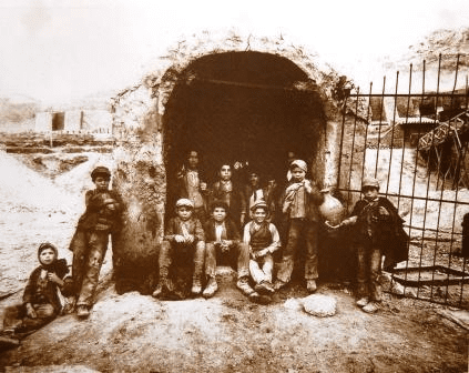 Eugenio Interguglielmi - "Sicily - Carusi (boys) before a sulphur mine" (1899)