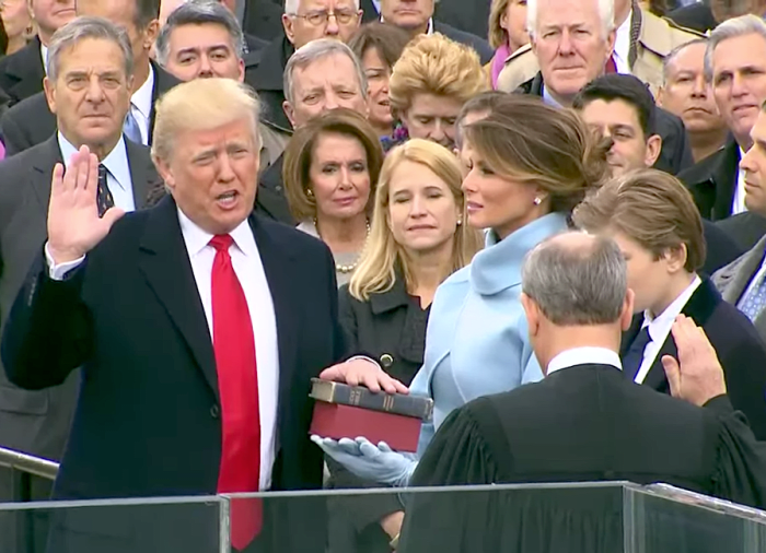 Donald Trump, with his family by his side, being sworn in as the 45th president of the United States by Chief Justice of the United States John G. Roberts, Jr. in Washington, D.C., January 20, 2017.