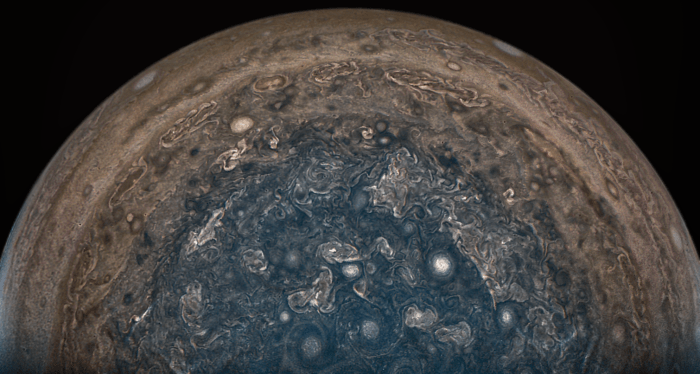 Jupiter's south pole is featured in this 2017 image taken by the Juno mission from about 63,000 miles above the cloud tops.