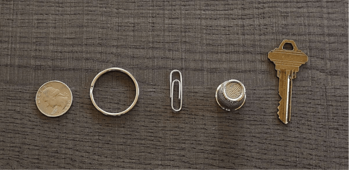 Tapping a metal object with anything from a thimble to a keychain before touching it with your skin will save you from static shock!