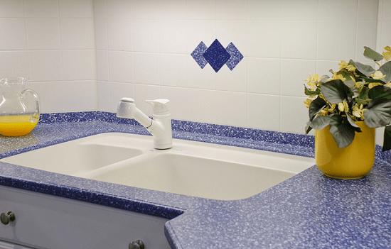 Beautiful Corian kitchen countertop and sink. Made from high-performance DuPont, this solid surface composite is available in a dazzling array of colours, forms, and styles.