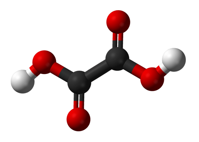 A model of an oxalic acid molecule: the black balls represent carbon atoms, the red ones represent oxygen atoms, and the white ones represent hydrogen atoms
