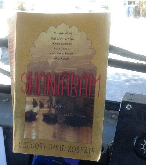 Join Mel for lunch beneath his favorite tree with the novel Shantaram by Gregory David Roberts