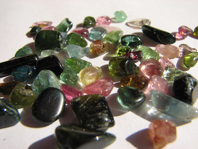 tourmaline--it comes in shades of pinks and greens. The black protects you from those who wish you harm.