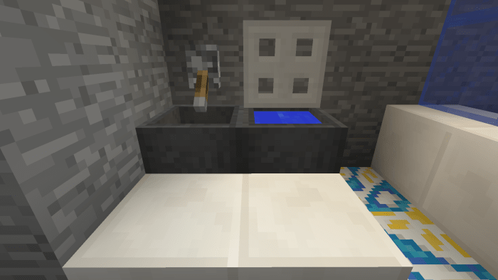 Placing stone slabs in front of the sink and toilet makes the bathroom look more fancy.
