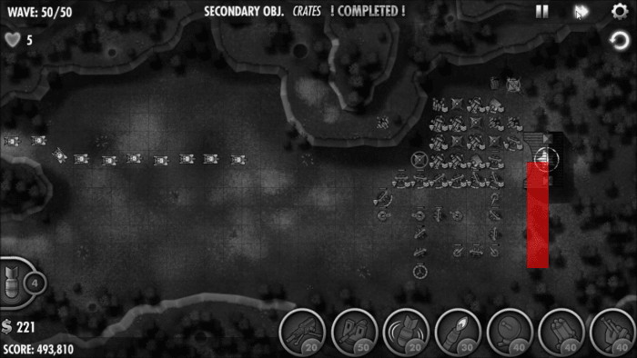 Marked in red is the strip of land where you can safely drop bombs, still damage enemy units which are about to break past your defenses, but without hurting your own turrets.