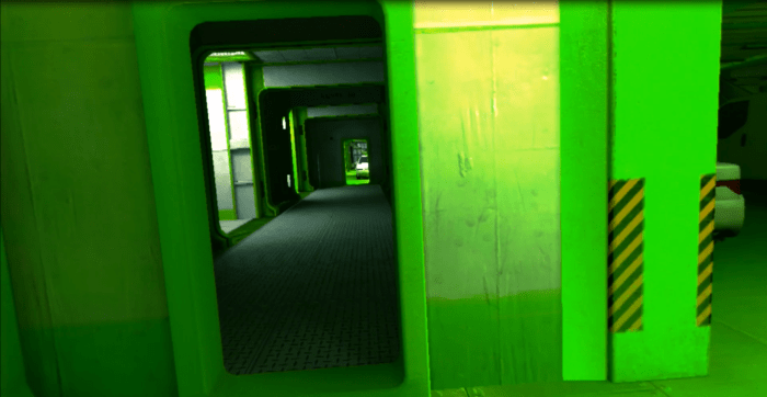 Faith explores an area inside of 'The Boat' chapter. Note the vibrant green colouration, a staple of this particular level.