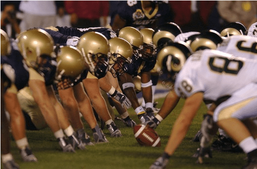 Players prepared for a kickoff. No Charlie Brown shenanigans are allowed in the NFL, or players would receive a penalty.