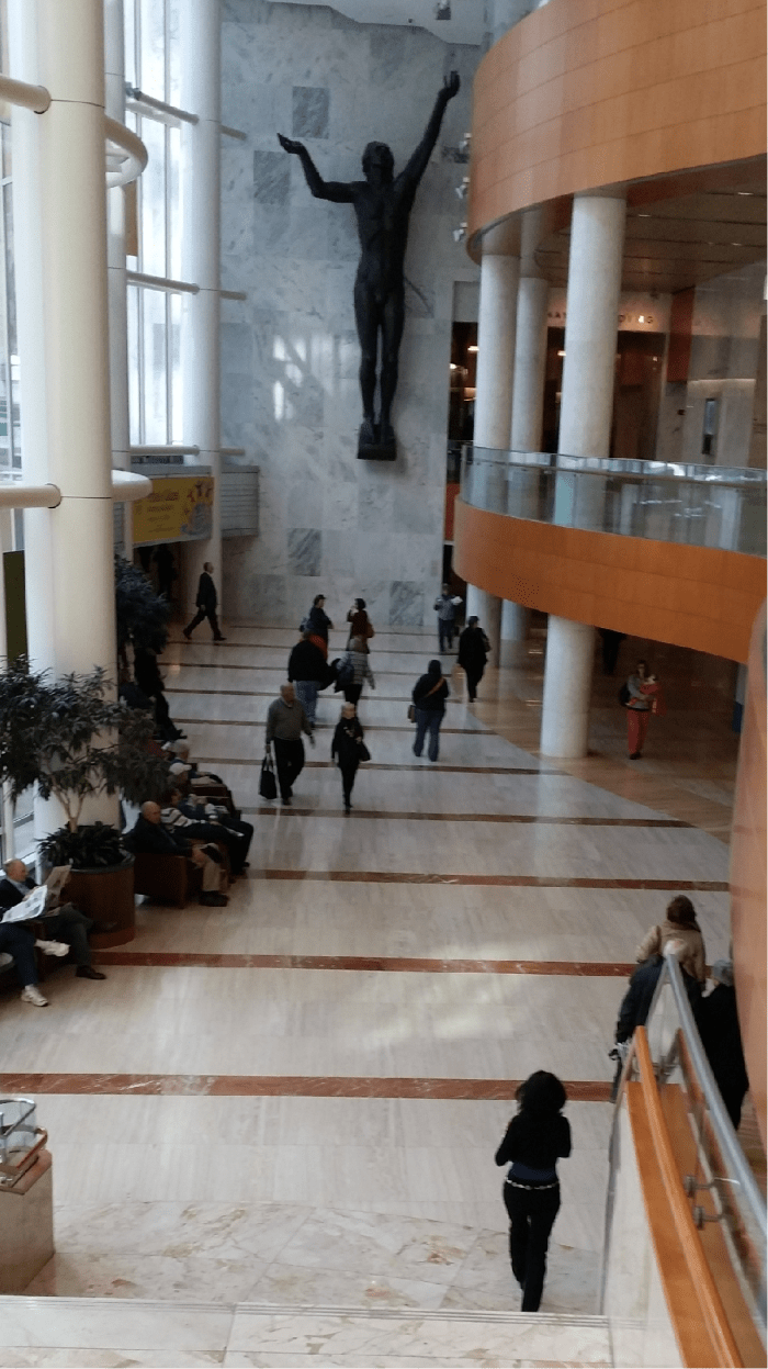 photo taken at Mayo Clinic Gonda Building with woman wearing a fashionable black outfit with a silver concho belt